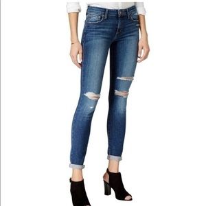 JOE’S DISTRESSED SKINNY JEANS.